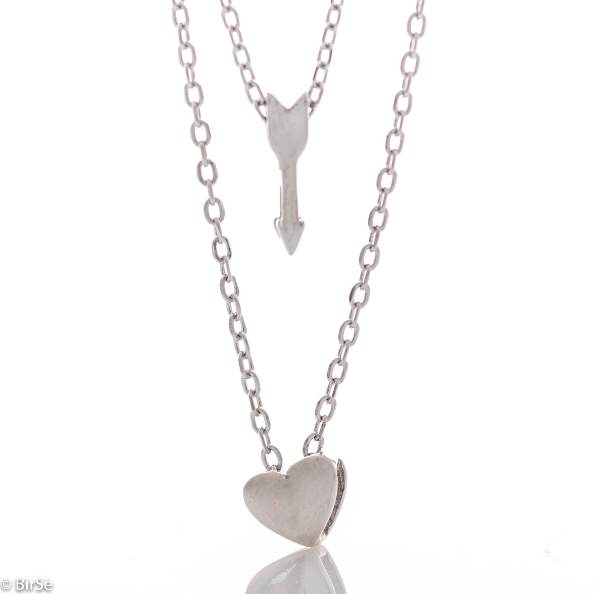 Double sterling silver necklace with two delicate heart and arrow elements and exquisite workmanship entirely in lustrous rhodium silver.