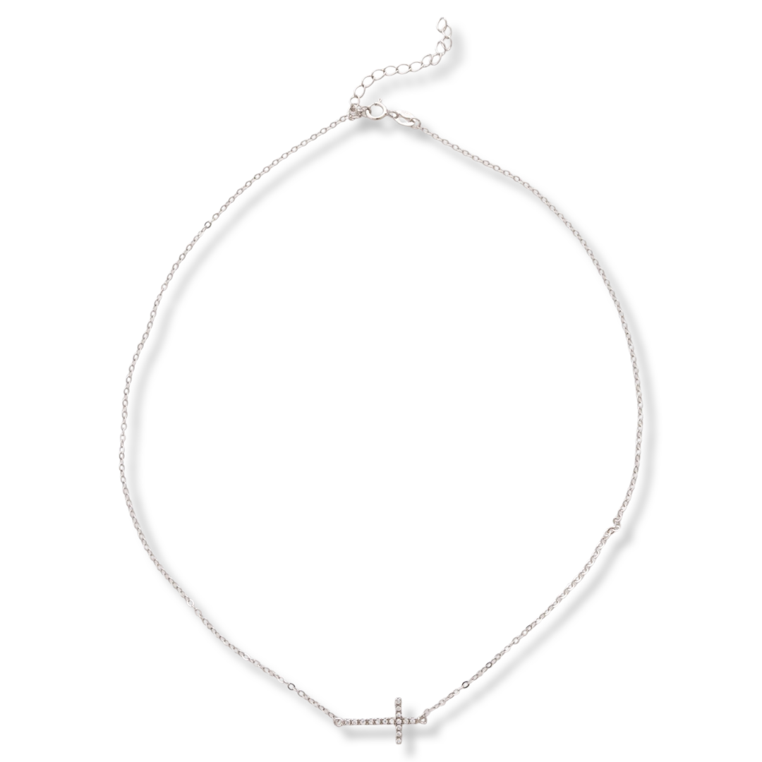 Stylish women's necklace, elegantly crafted from fine rhodium silver as a fine chain holding a beautiful cross studded with sparkling zircons. The jewelry is suitable for any lady's casual or formal outfit.