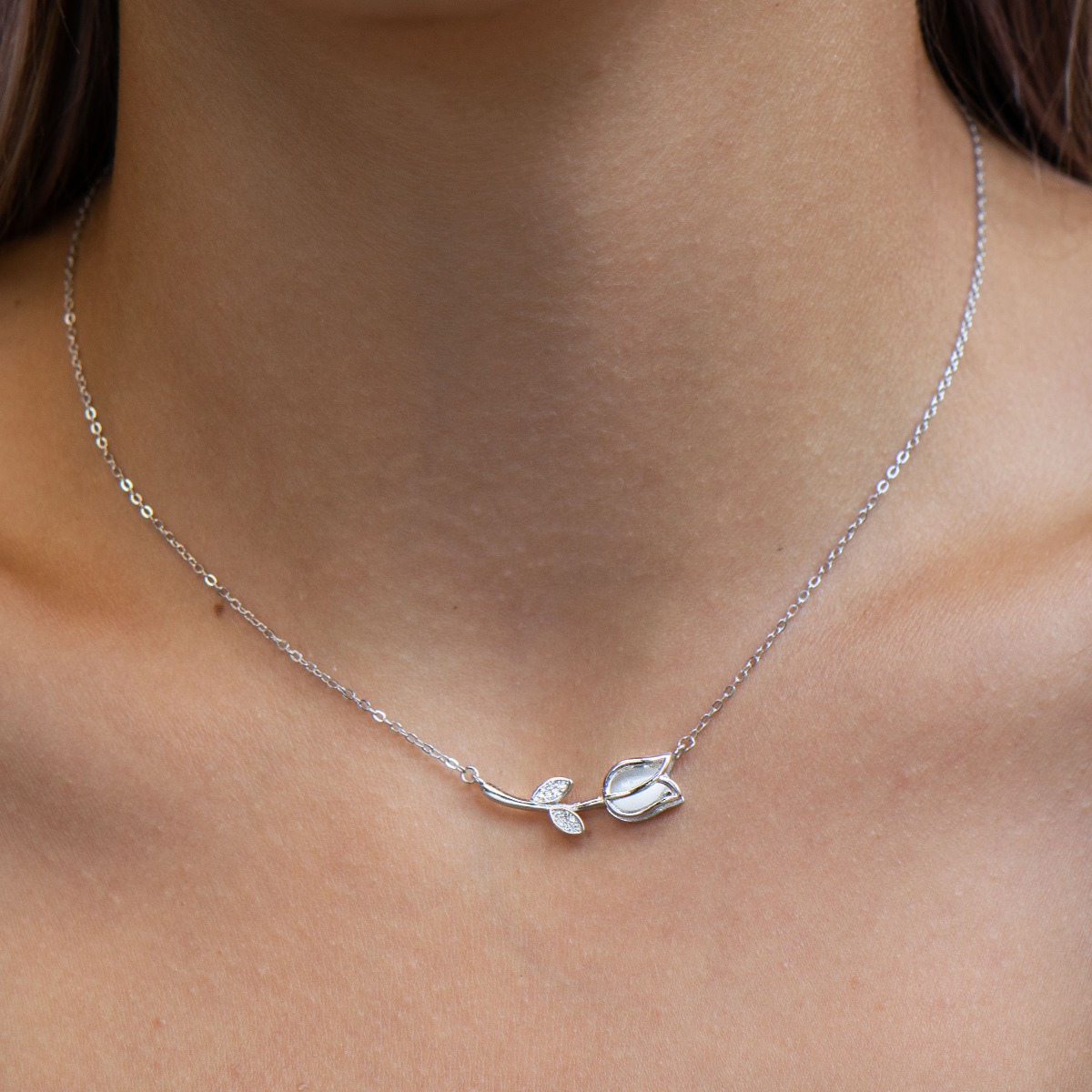 Silver necklace "Tulip" - the new charming necklace made of rhodium-plated silver and zircons from the BirSe collection, which will charm your favorite girl. A suitable gift for any occasion.