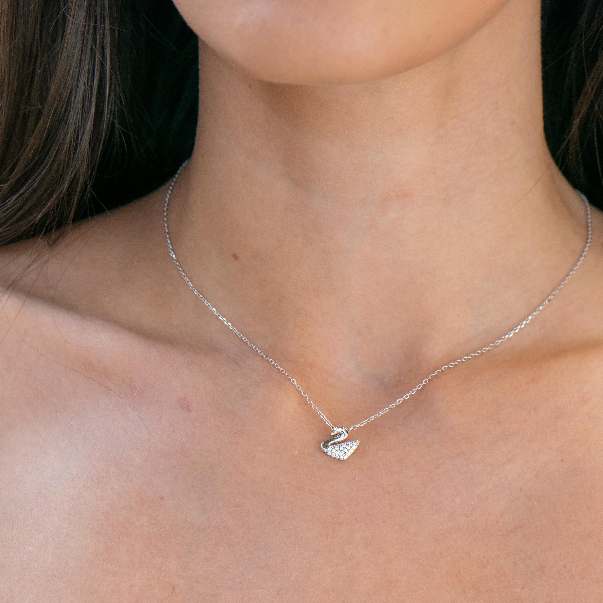 Silver necklace "Swan" - A beautiful proposal from BirSe for ladies who like delicate silver jewelry, exquisitely encrusted with dazzling zircons. It can be combined with earrings of a similar design.