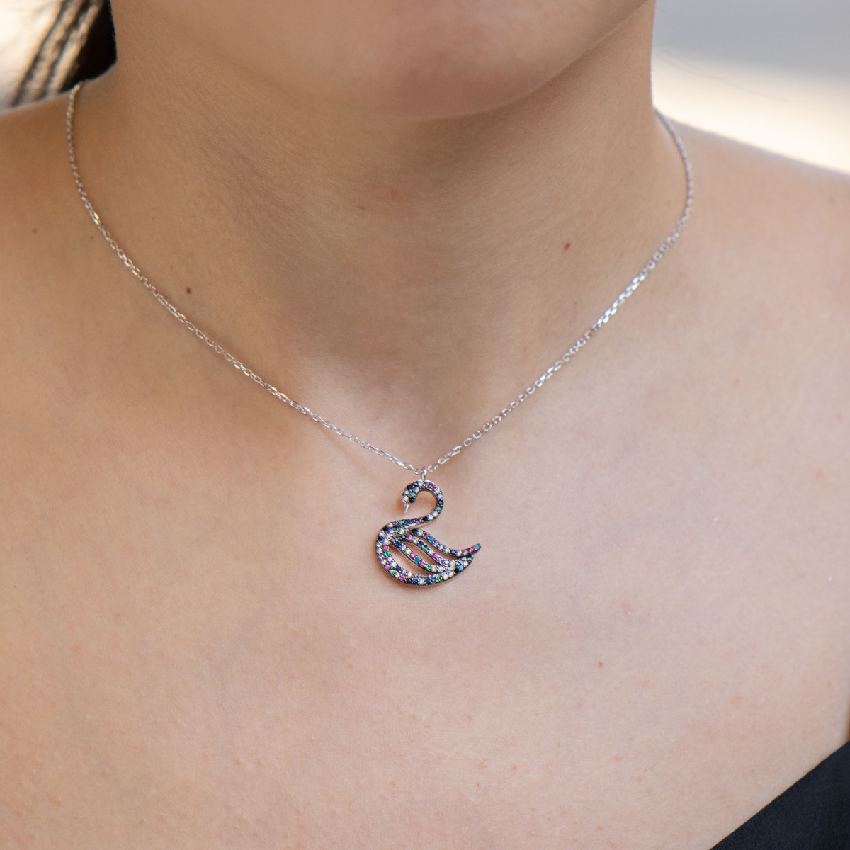 Exquisite workmanship of rhodium silver swan necklace, precisely decorated with multi-colored sparkling zircons.