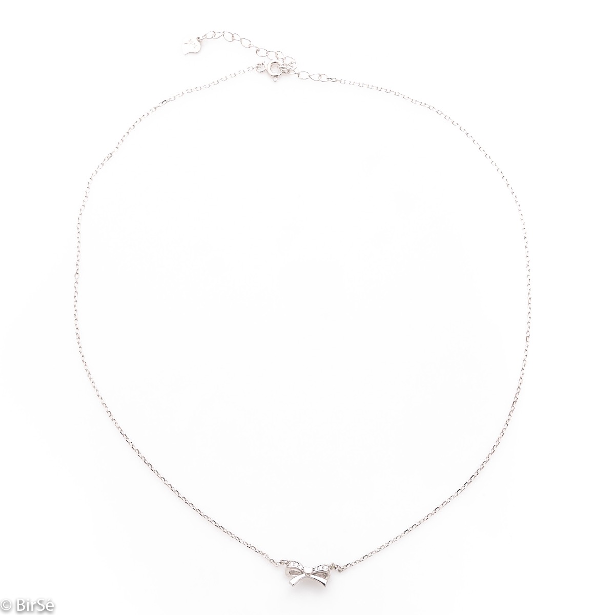 A fine sterling silver necklace with a dainty element of a small heart ribbon, made entirely of lustrous rhodium silver.