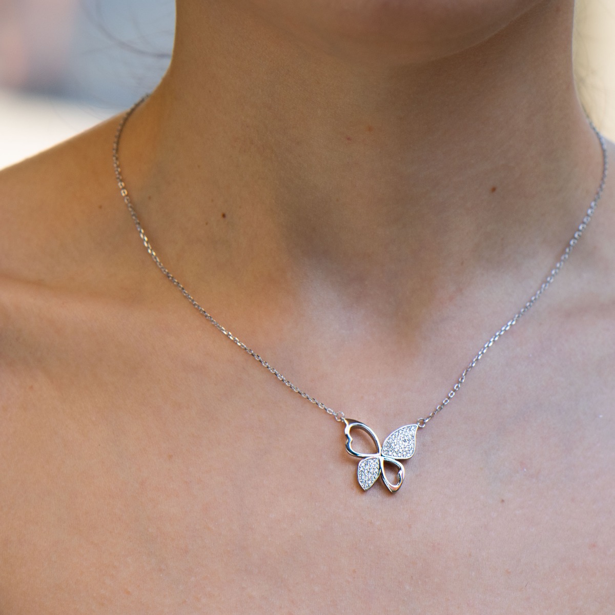 Elegant silver butterfly necklace for women is precisely crafted, combining exquisite rhodium-plated silver with sparkling fine zircons.