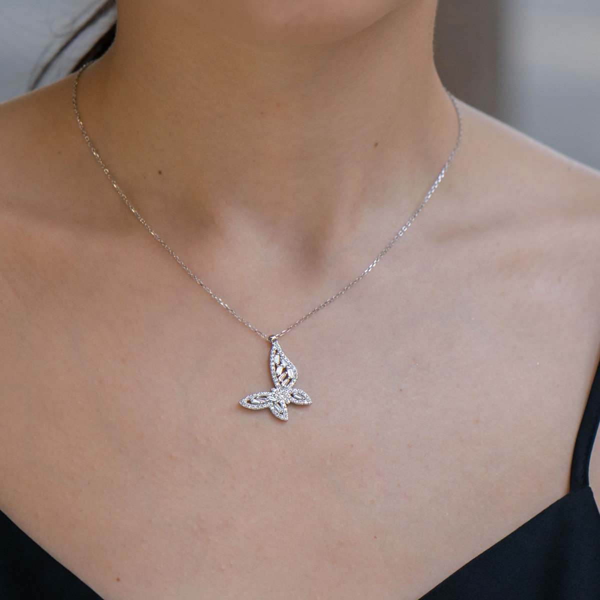 Silver necklace "Ethereal Butterfly" - Elegant women's necklace with precise craftsmanship, combining exquisite rhodium-plated silver with brilliant fine zircons of different shapes.