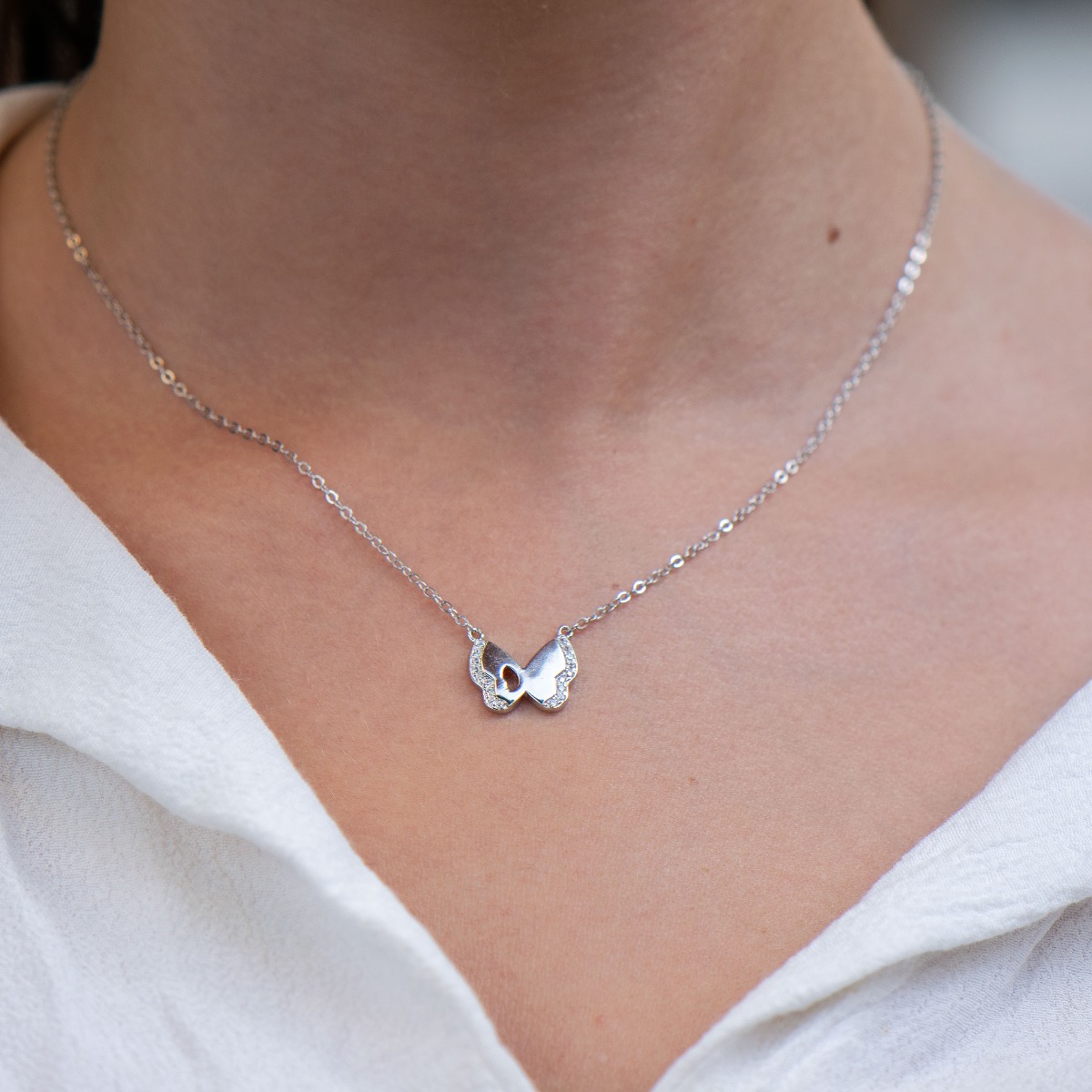 Silver necklace "Butterfly" - a lovely piece of jewelry from the BirSe collection that will charm your favorite girl. It is made entirely of rhodium-plated silver and fine zircons. A suitable gift for any occasion.