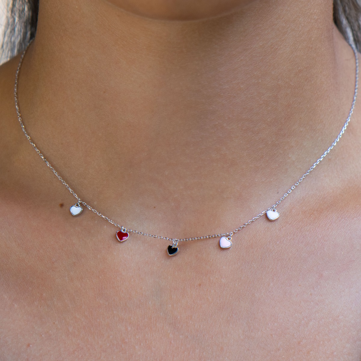 The different shades of love in the charming women's necklace of fine rhodium silver, beautiful hearts and colored enamel. This is what BirSe offers you in its new silver collection.