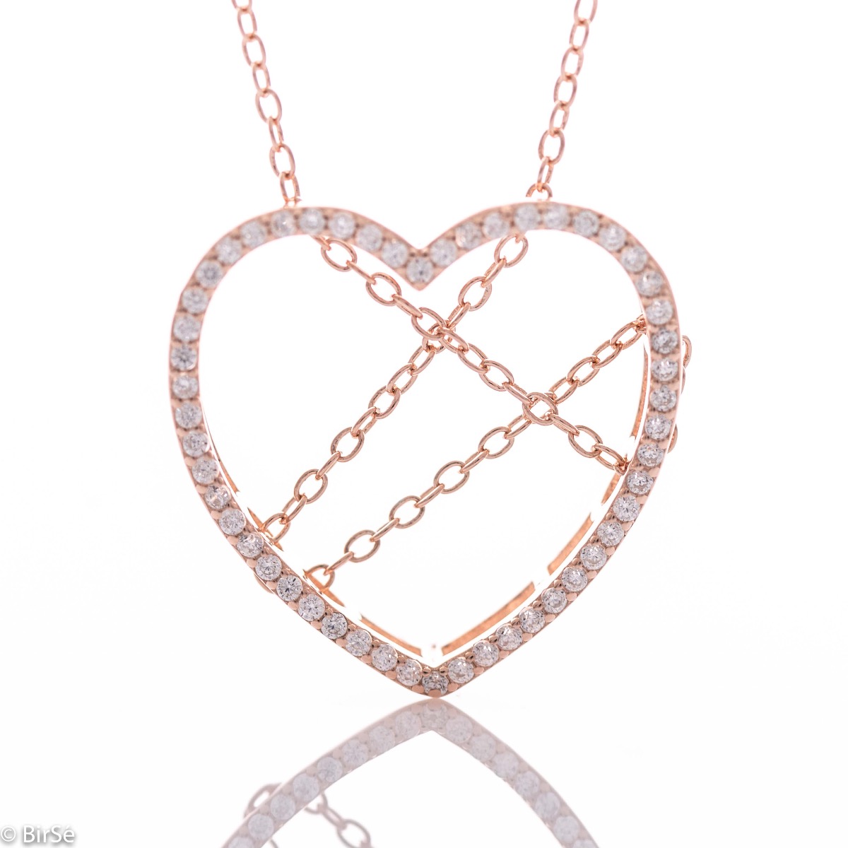 Spectacular silver necklace with exquisite workmanship entirely of rhodium-plated rose silver and a large heart, complemented by glittering zircons and a spectacular tangled chain.