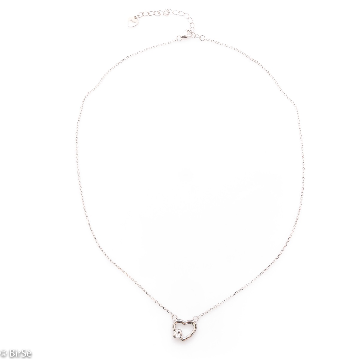 A delicate silver necklace with a heart and a sparkling zircon, made entirely of refined rhodium-plated silver.