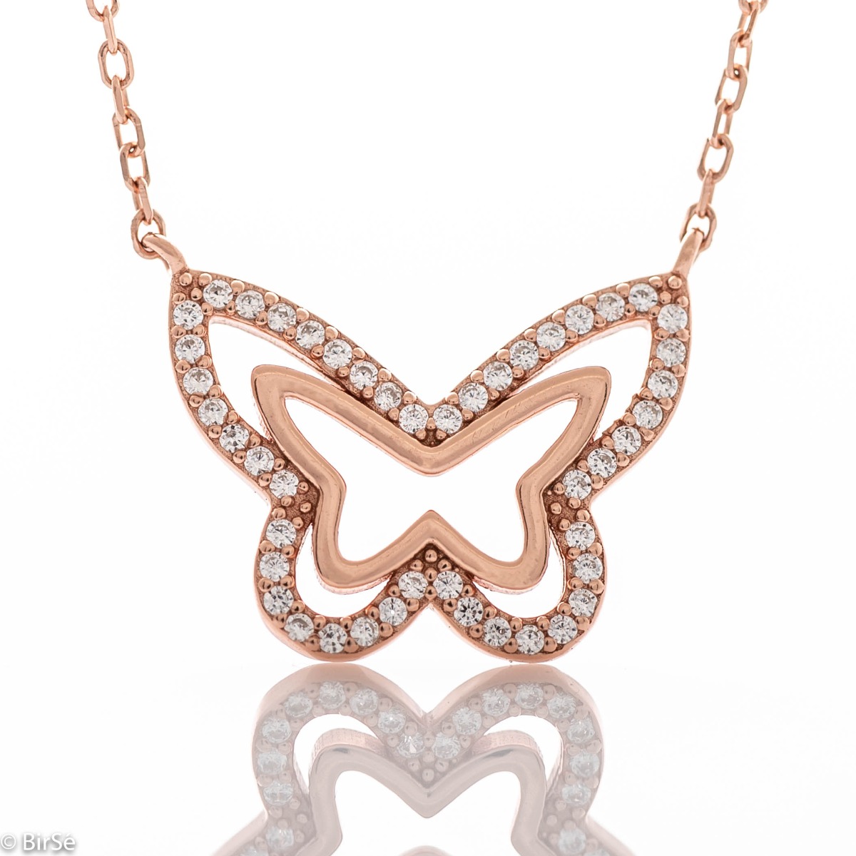 A beautiful women's necklace with a delicate butterfly, complemented by sparkling white zircons and made entirely of soft rhodium-plated rose silver.