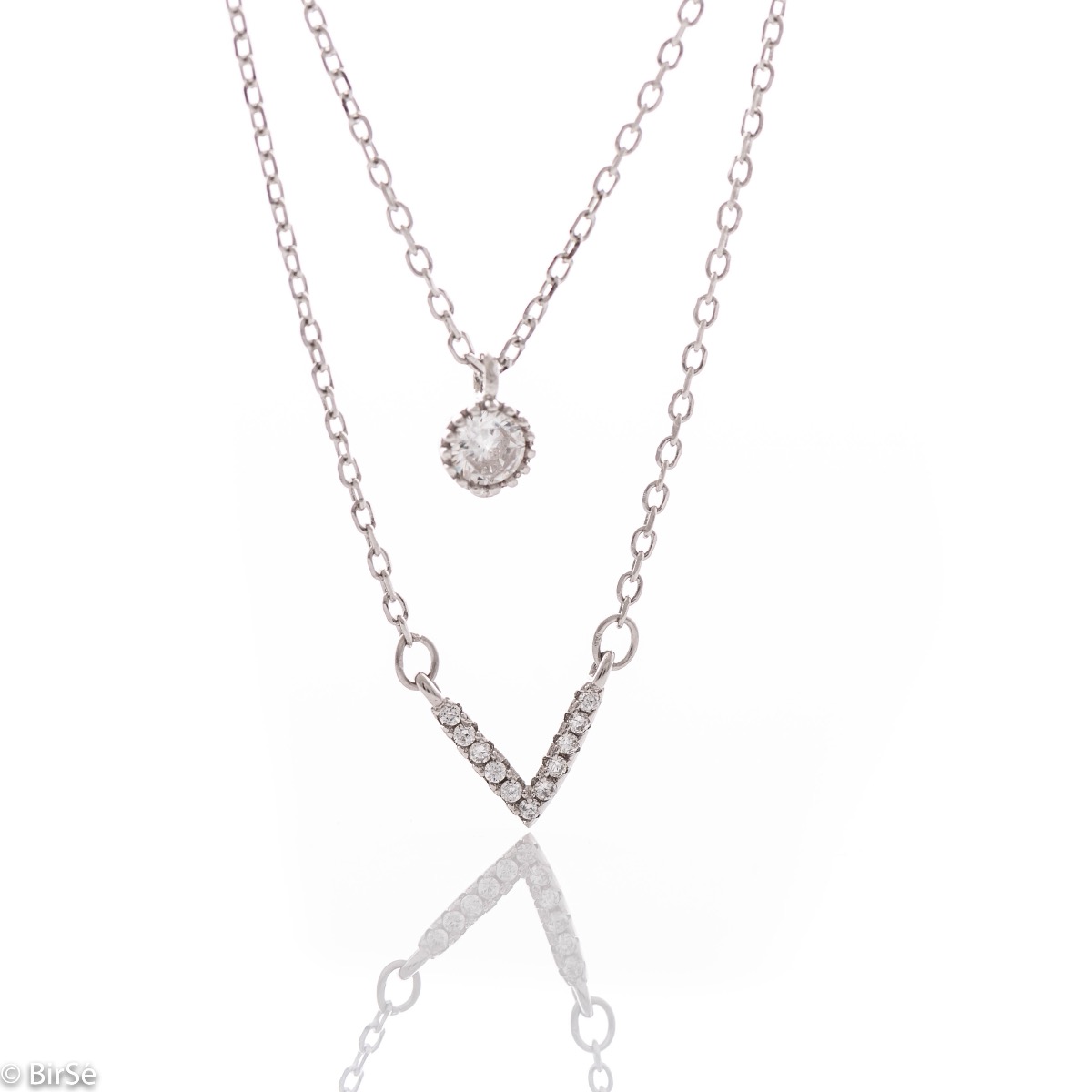 Extremely delicate and elegant women's necklace with a double chain and exquisite elements. Precise craftsmanship combining brilliant rhodium silver with fine zircons.