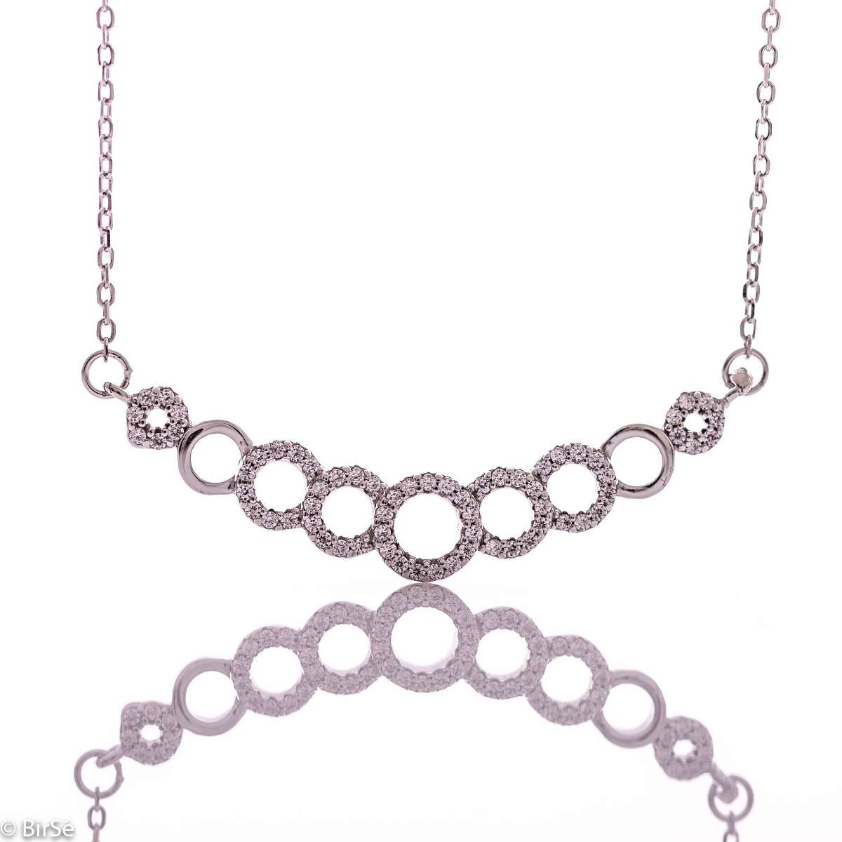 An elegant women's necklace with fine workmanship, combining rhodium-plated silver with sparkling zircons, combined in spectacular circles and a sophisticated design.