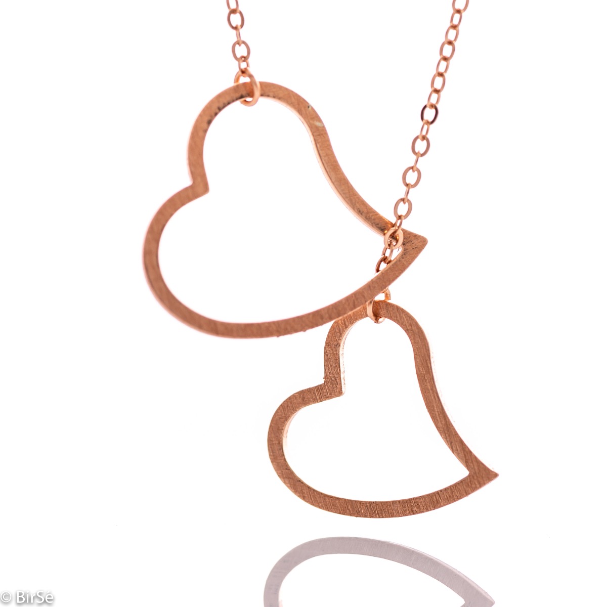 Spectacular and beautiful women's necklace combining two delicate hearts and made entirely of shiny rhodium-plated rose silver.