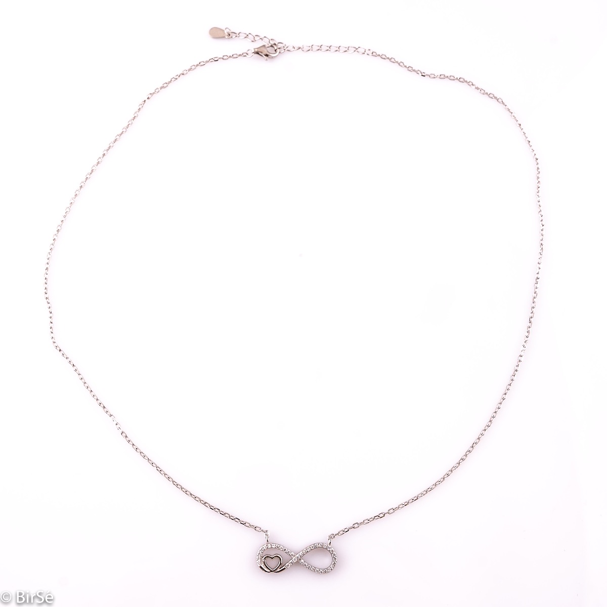 An exquisite women's necklace with precision craftsmanship entirely of rhodium-plated silver, combining a delicate infinity shape, intertwined with a heart and sparkling zircons.