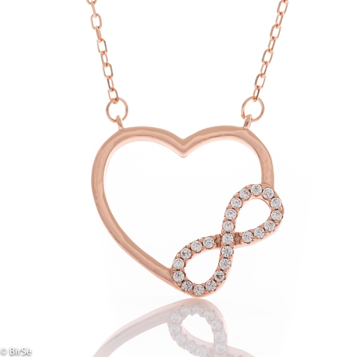 An exquisite women's necklace made entirely of rhodium-plated rose silver, complemented by sparkling zircons and a beautiful heart shape, intertwining a gentle infinity.