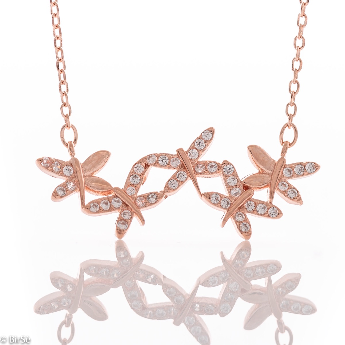 Spectacular women's necklace with precise and fine workmanship entirely of soft pink silver, complemented by glittering zircons and an exquisite shape of numerous small butterflies.