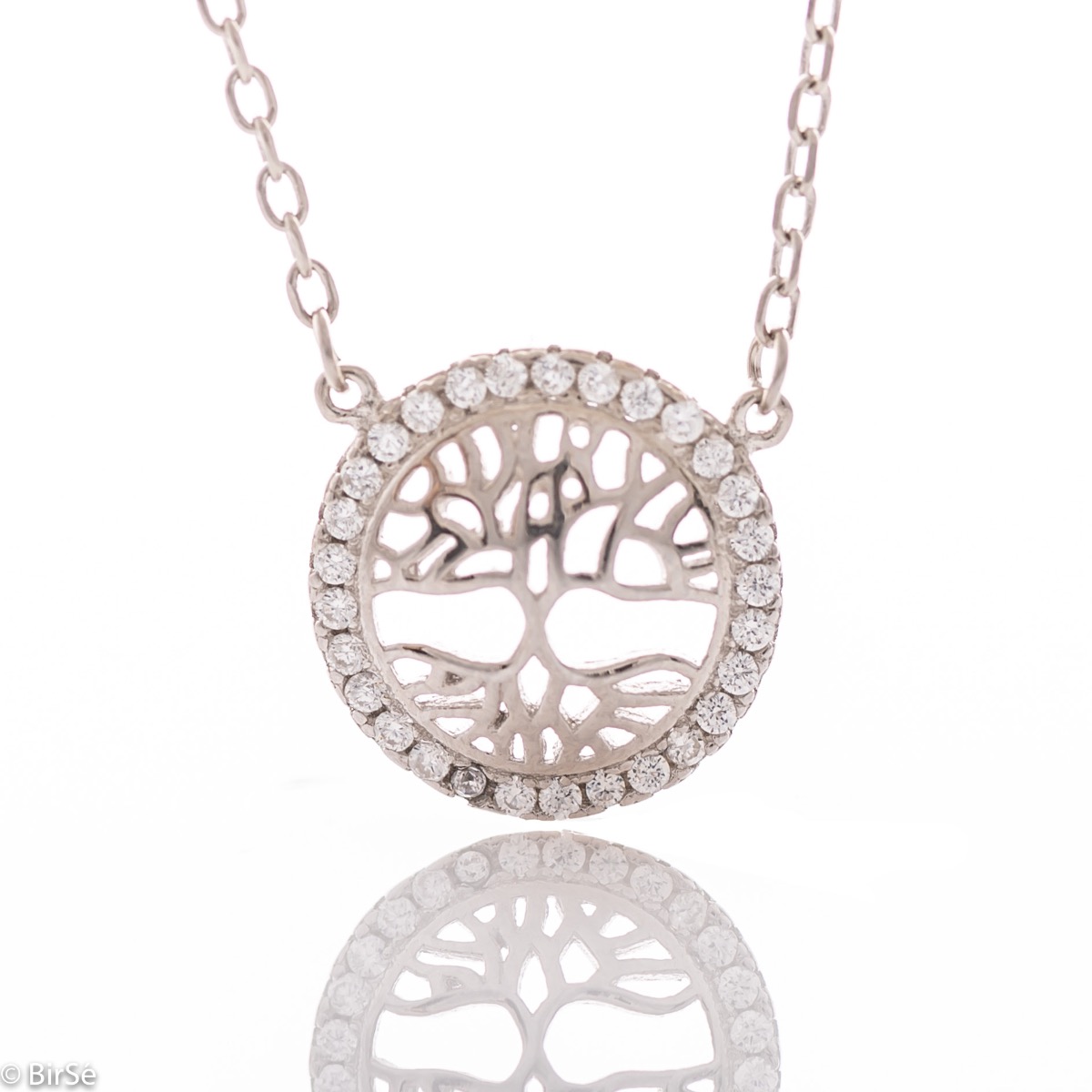 A charming women's necklace with precision craftsmanship in rhodium silver and delicate details forming the tree of life surrounded by sparkling zircons.