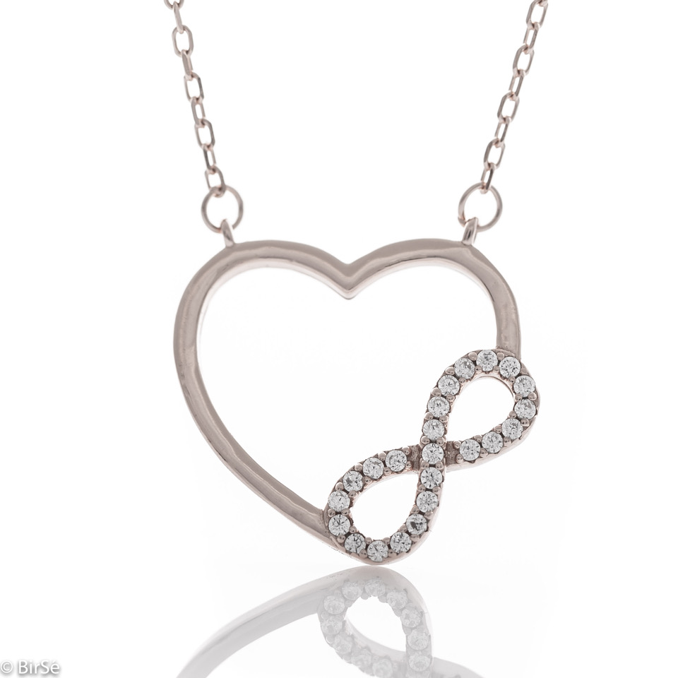 Extremely delicate silver necklace in the shape of a heart and infinity flowing into each other. Stylish compositional design of the elements and details from a fine combination of rhodium-plated silver with sparkling zircon stones.