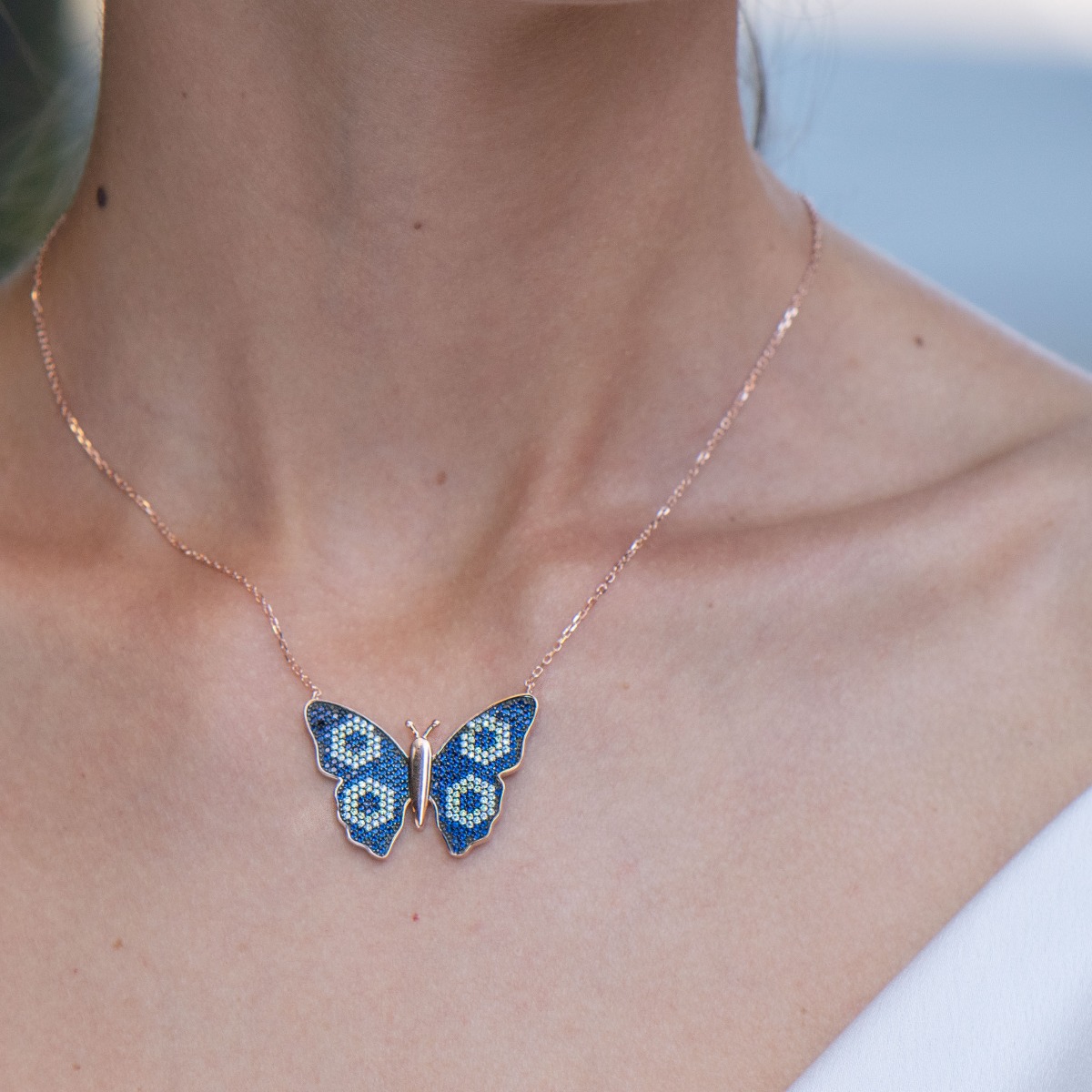 Spectacular rhodium-plated rose silver necklace with a precisely crafted butterfly. Beautifully spread wings in flight, sparkling with multi-colored zircons - a piece of jewelry that any woman would wear with great pleasure.