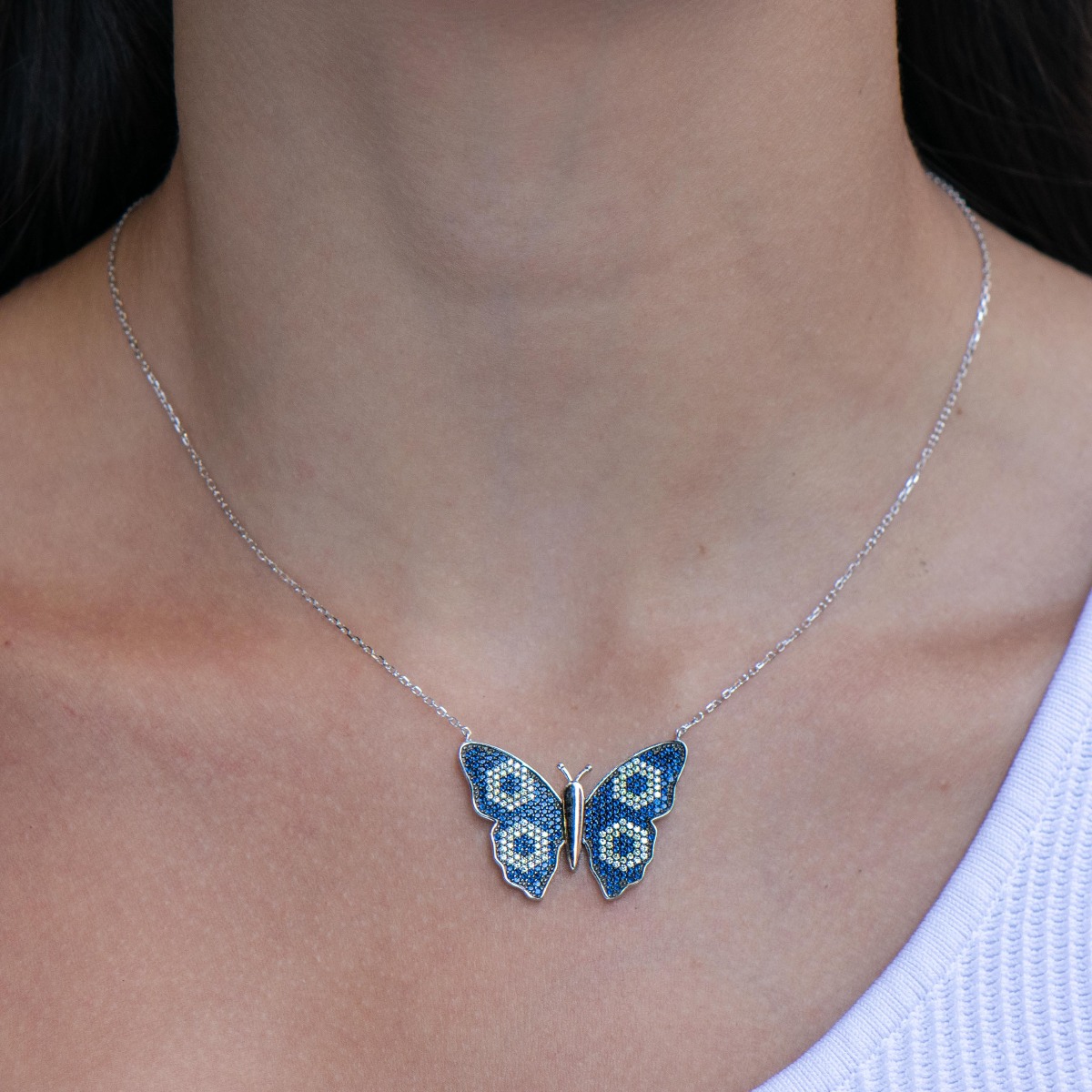 Elegant butterfly necklace for women with precision craftsmanship, combining exquisite rhodium-plated silver with sparkling fine multi-colored zircons.