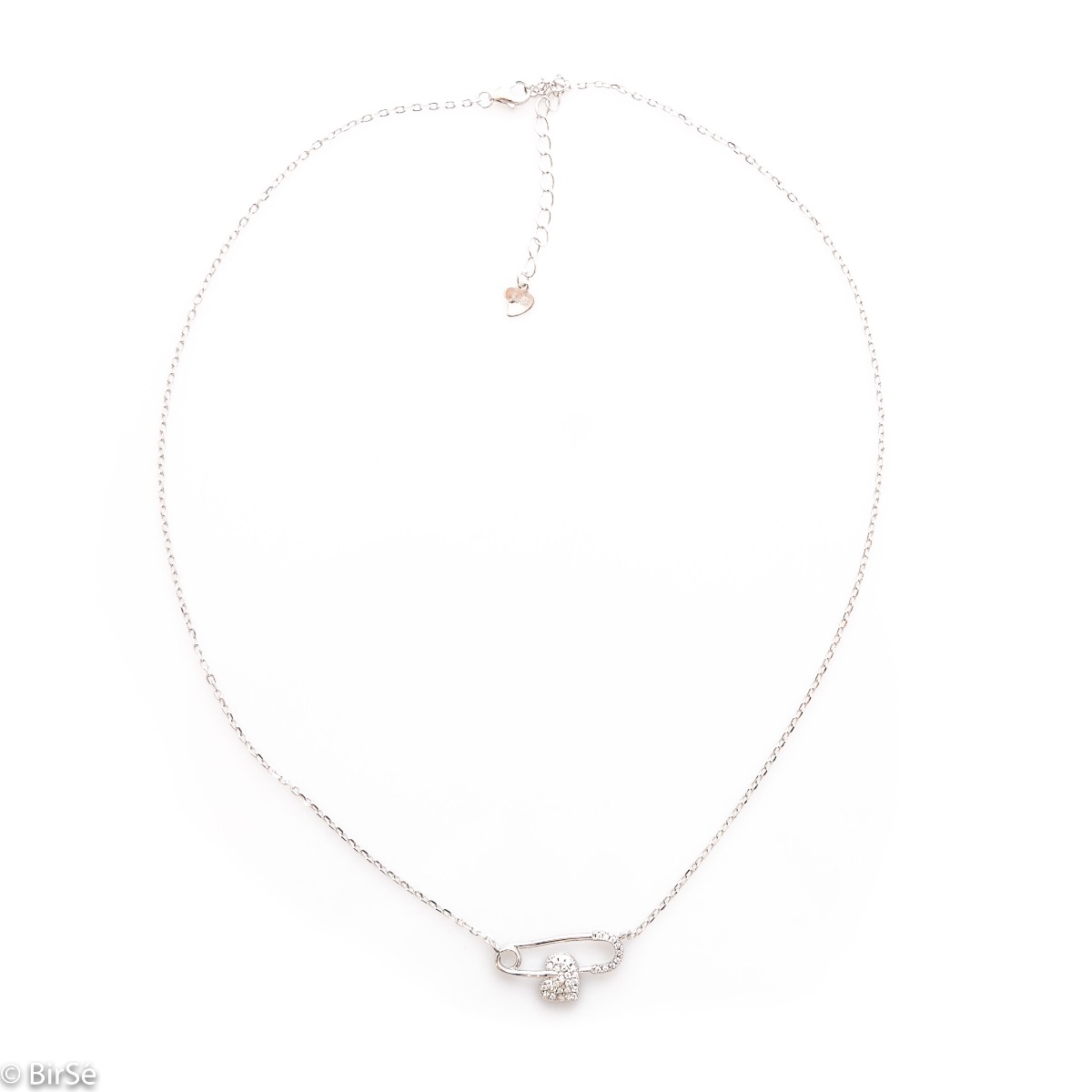 A spectacular silver necklace with delicate craftsmanship and a stylish design, combining rhodium-plated silver with an elegant safety pin element and a sparkling heart with zircons.