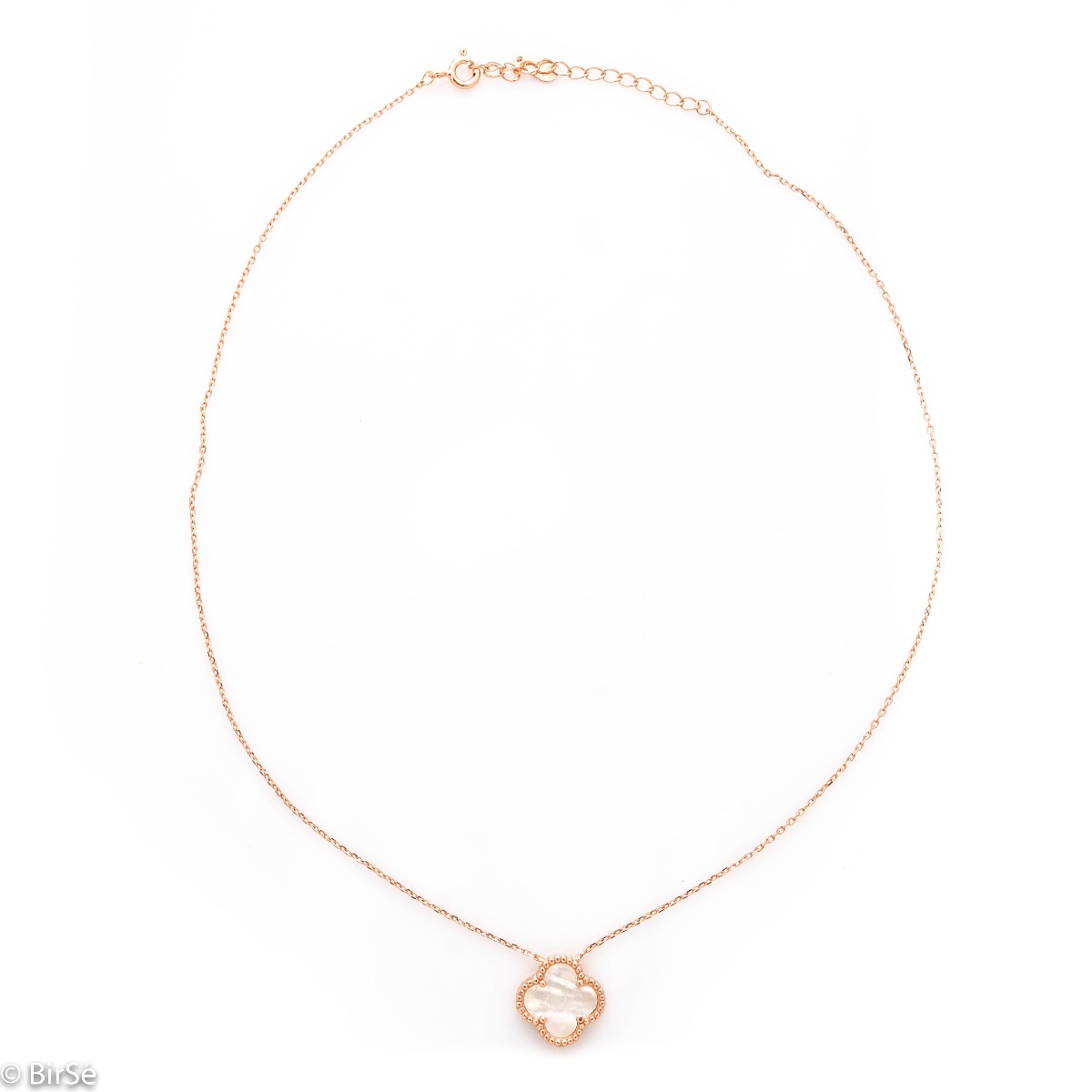 Fine silver clover necklace. Beautifully crafted in rhodium-plated rose silver, it gently envelops a fine mother-of-pearl in the shape of a four-leaf clover. The chain is delicate, with an extender to be worn according to the lady's preference.