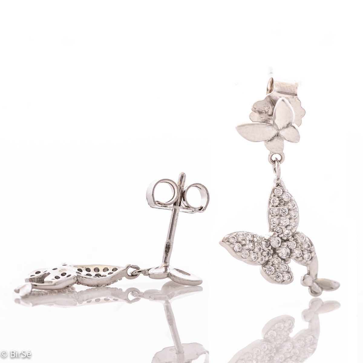 Elegant women's earrings made of rhodium-plated fine silver. Exquisite jewelry with dangling butterflies that are decorated with delicate zircons, stylish design and comfortable pin fastening. A wonderful gift for your beloved woman.