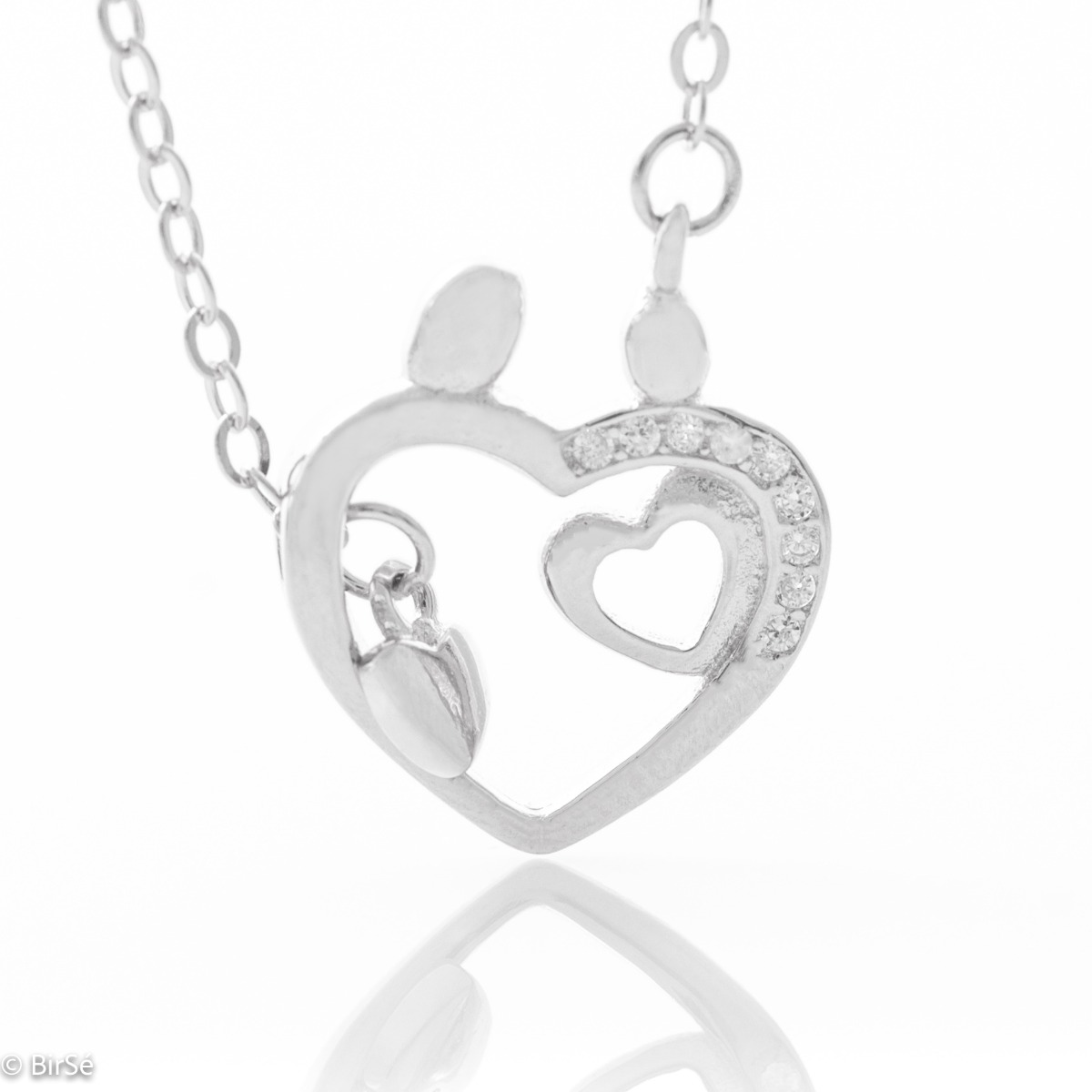 An interesting rhodium-plated sterling silver heart-shaped necklace with a similar pendant set at the end of an adjustable chain. Catchy jewelry for your everyday life.