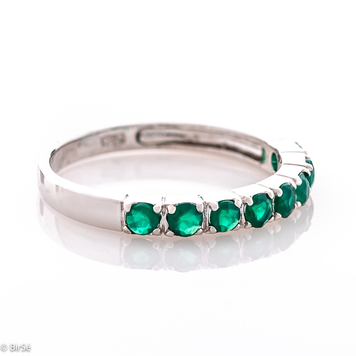 Enchanting silver ring with a row of natural green agate stones and delicately crafted entirely from glittering rhodium silver...As if inviting you to make it part of your jewelry.