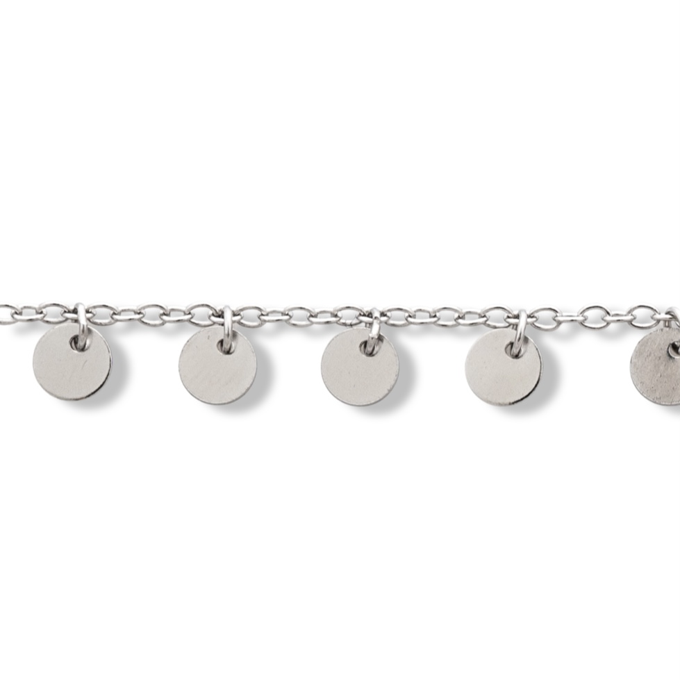 An exquisite women's ankle bracelet made entirely of fine rhodium silver with countless charming coin pendants. This jewel will add charm to your body during the summer months.