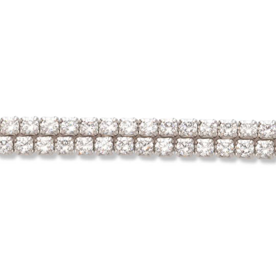 Dazzling women's jewelry in soft silver with exquisite workmanship of two rows of sparkling zircons. The fine women's bracelet has an extension, for more convenience when adjusting the length. Captivating charm from BirSe for your special moments.