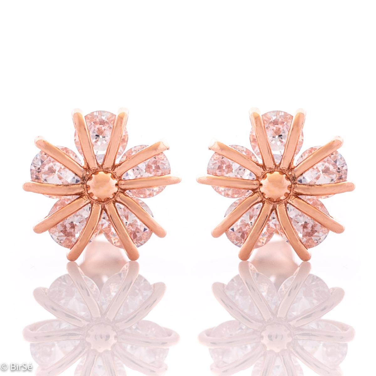 Enchanting Flowers Silver Earrings - an exquisite piece of jewelry made entirely of fine, sparkling silver. Five dazzling zircons are elegantly caught by rose silver strands forming a flower. The earrings have a comfortable pin fastening and are suitable 