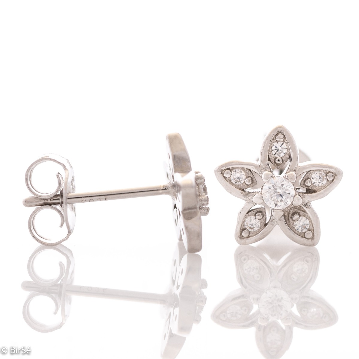 Delicate and glamorous women's shift earrings, with precise craftsmanship entirely of rhodium-plated silver and a flower of fine zircons. Suitable for small and large ladies.