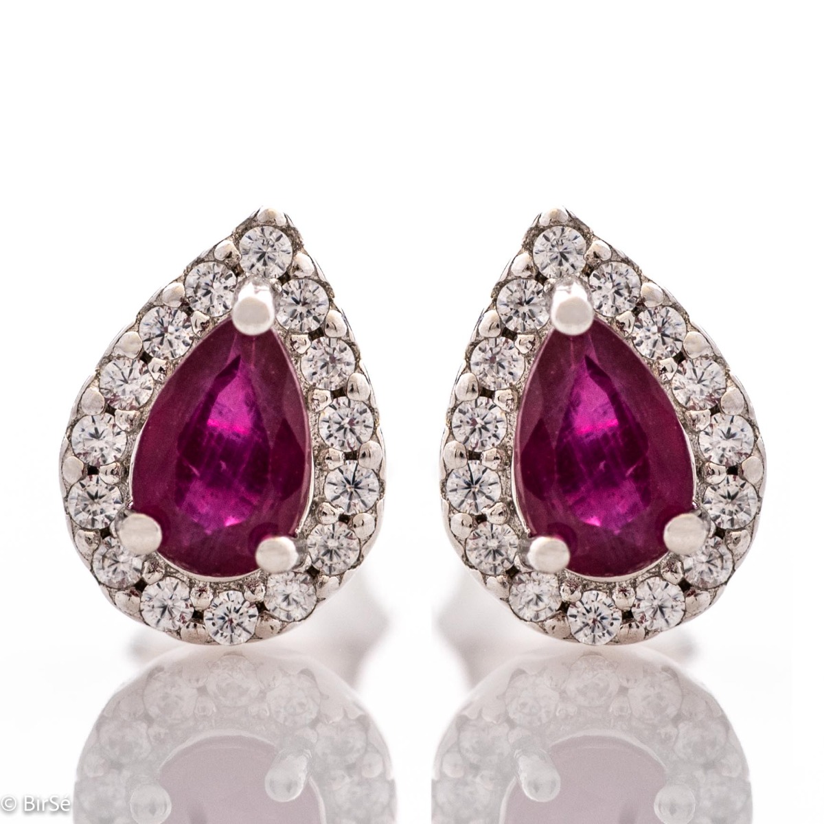 Radiant stud earrings delicately crafted in a teardrop shape and finely rhodium-plated sterling silver, complemented by exquisite natural rubies and sparkling zircons.