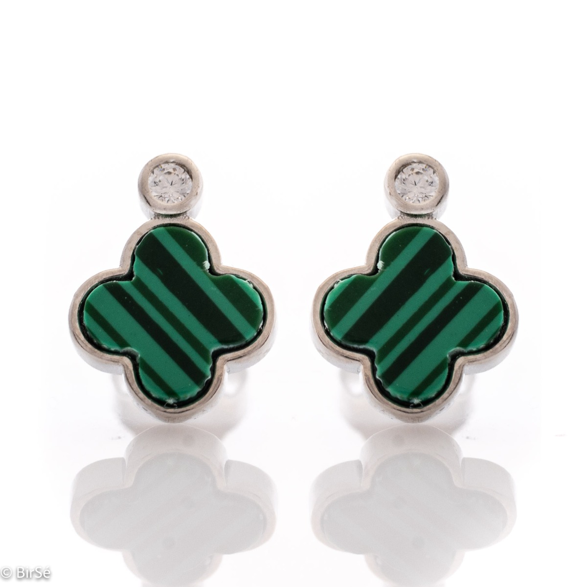 Delicate women's clover earrings with delicately shaped details of beautiful rhodium silver and captivating malachite, complemented by sparkling zircon. Stylish and elegant jewelry with a pin fastening, they are extremely convenient for every lady's every