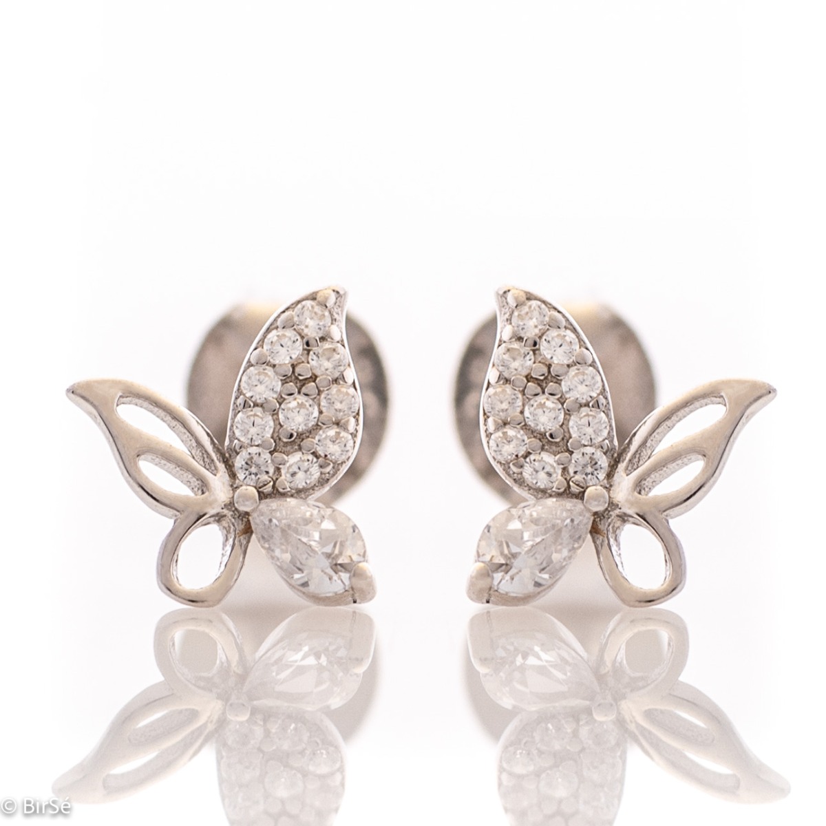 Charming earrings in soft rhodium silver in the shape of a butterfly encrusted with zircons. The earrings are suitable for children and young girls. Pin fastening is comfortable and secure.