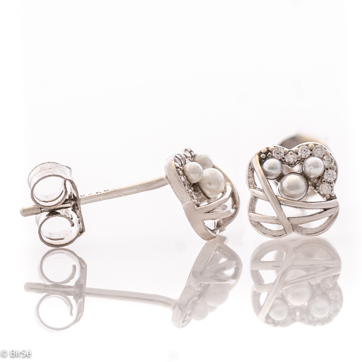 Exquisite charming earrings "Pearl Tenderness" made of fine rhodium silver, with delicate precision workmanship and an extremely spectacular model, decorated with dazzling zircons and pearls. Suitable for any occasion.