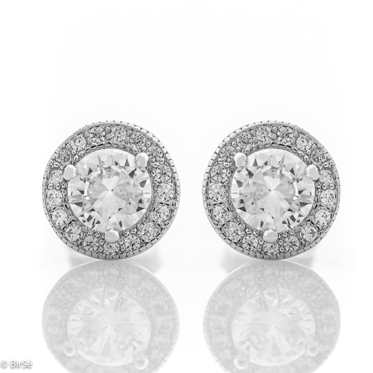 Fine sterling silver stud earrings with round and precise craftsmanship entirely in rhodium silver, combined with numerous sparkling zircons and a central one.