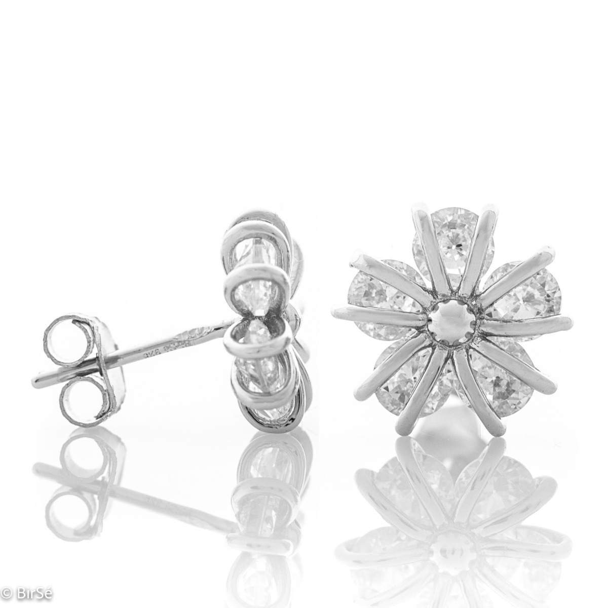 Enchanting Flowers Silver Earrings - an exquisite piece of jewelry made entirely of fine, sparkling silver. Five dazzling zircons are elegantly caught by strands of rhodium silver, forming a flower. The earrings have a convenient pin fastening and are sui