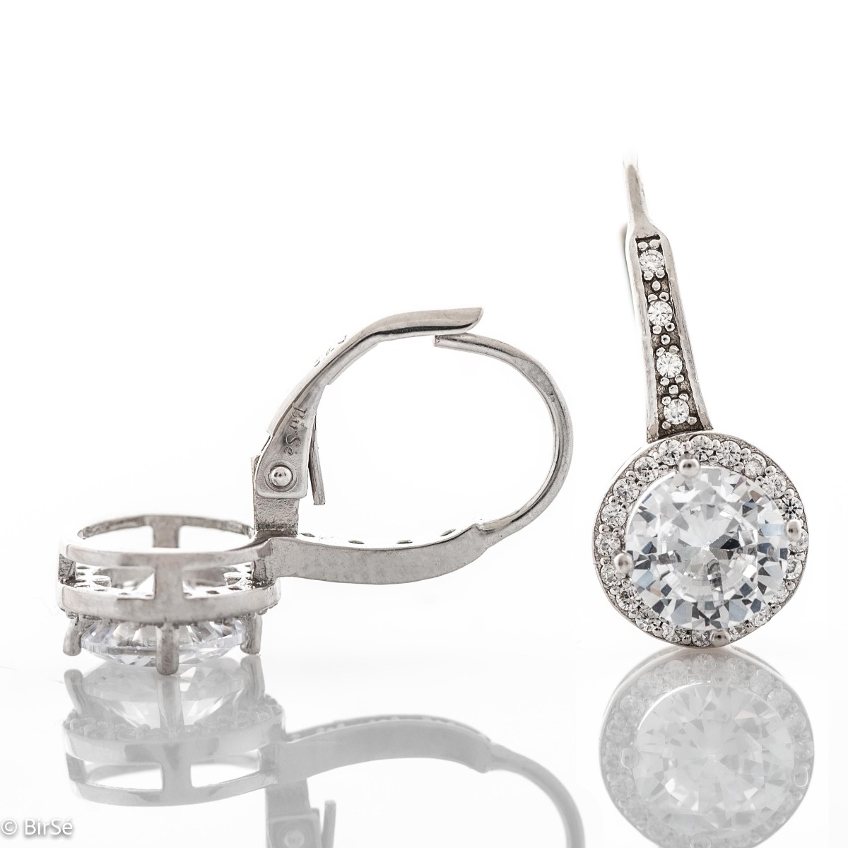 Extremely fine sterling silver earrings with a willow clasp and precise, slightly dangling craftsmanship, combining rhodium-plated silver with sparkling zircons.