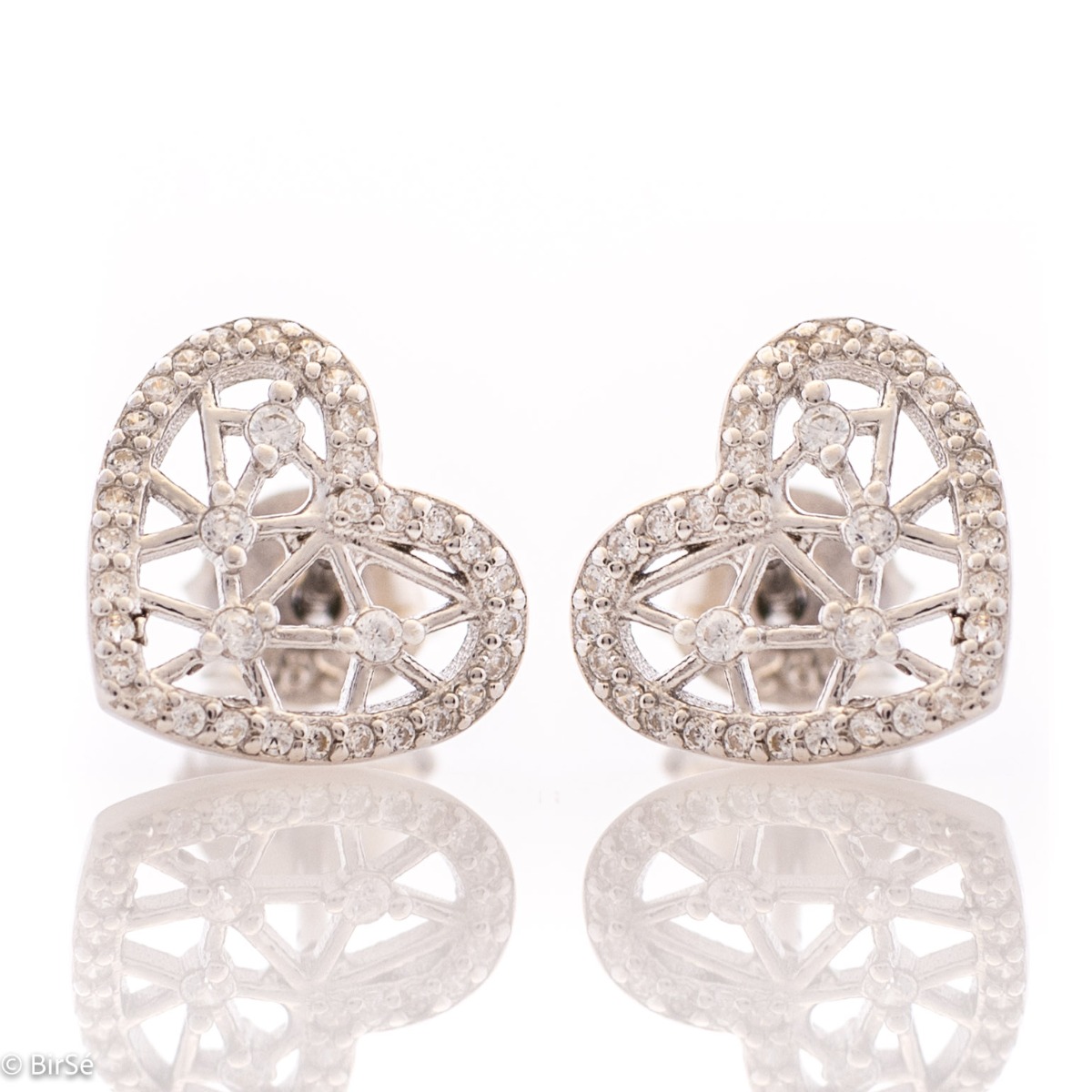 Charming women's earrings in the shape of a heart, in the middle with a delicate braid, like a spider web. Dazzling zircons like dewdrops shine on her. Jewelry is a suitable gift for any occasion. Pin fastening is comfortable and secure for little and big