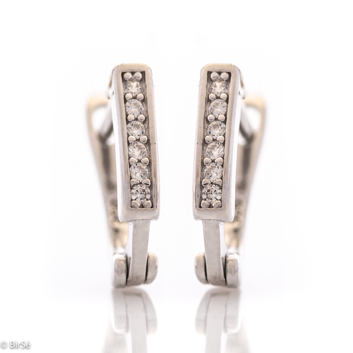 Graceful ladies' earrings made of rhodium-plated fine silver. The earrings are adorned with dazzling zircons, with a stylish design and a comfortable English clasp. Suitable jewelry for your everyday life.