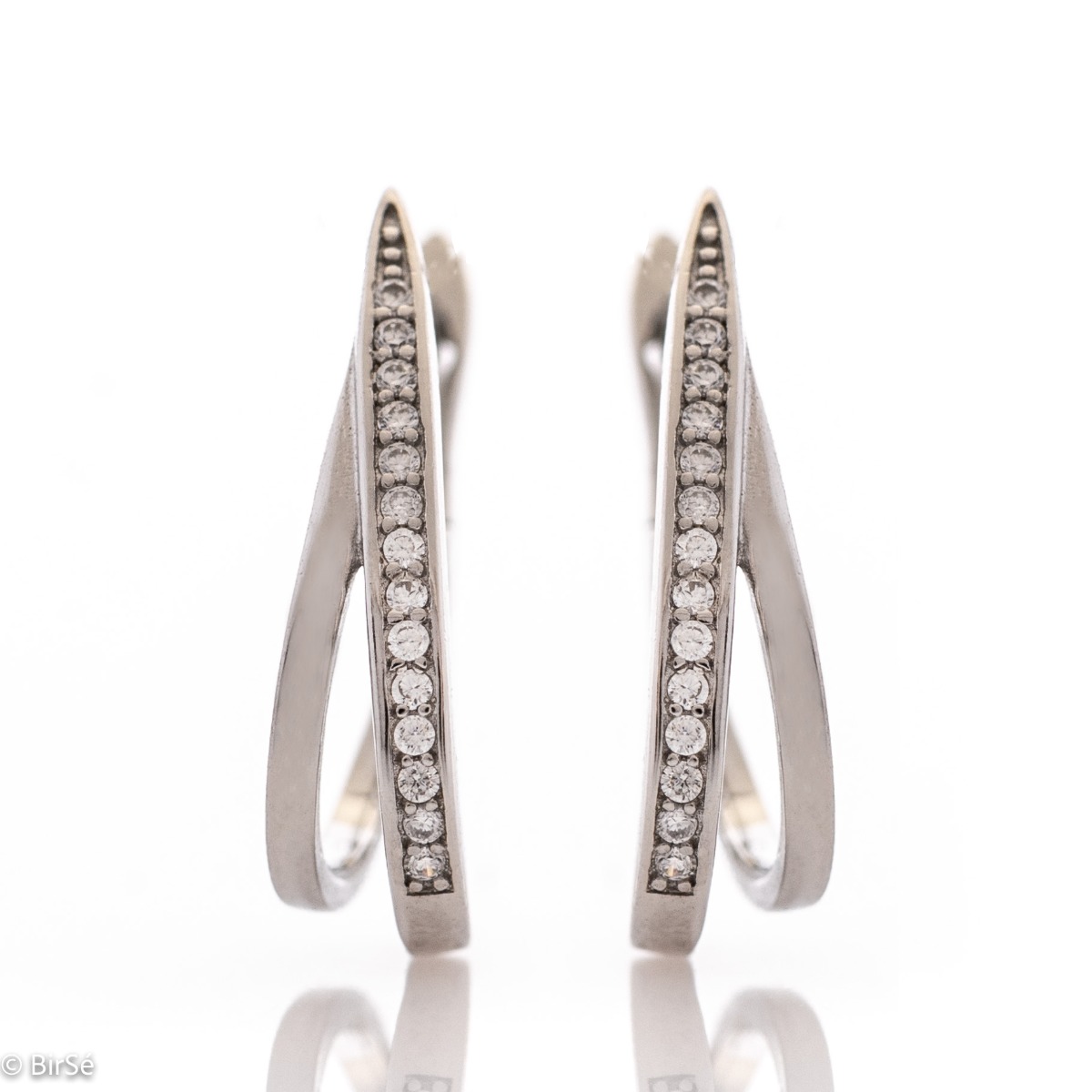 Captivating women's earrings with a spectacular shape and modern design. Made entirely of rhodium-plated fine silver with the convenient English clasp, they are a wonderful gift for your beloved woman's everyday outfit and wonderful mood. And the added zi