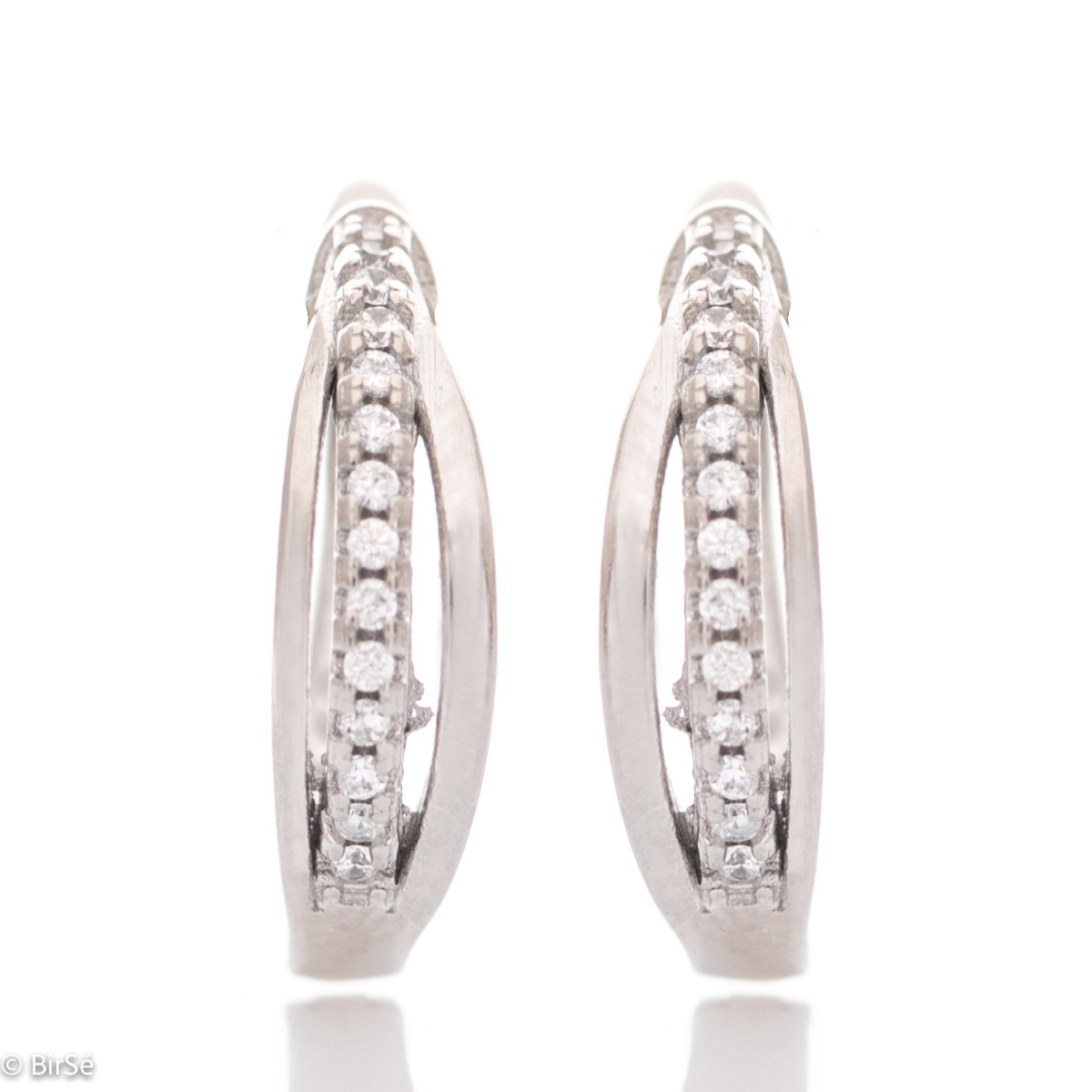 Elegant earrings with a stylish design, fine elements of rhodium-plated silver, decorated with sparkling zircons. The earrings have an English fastening - practical and secure.