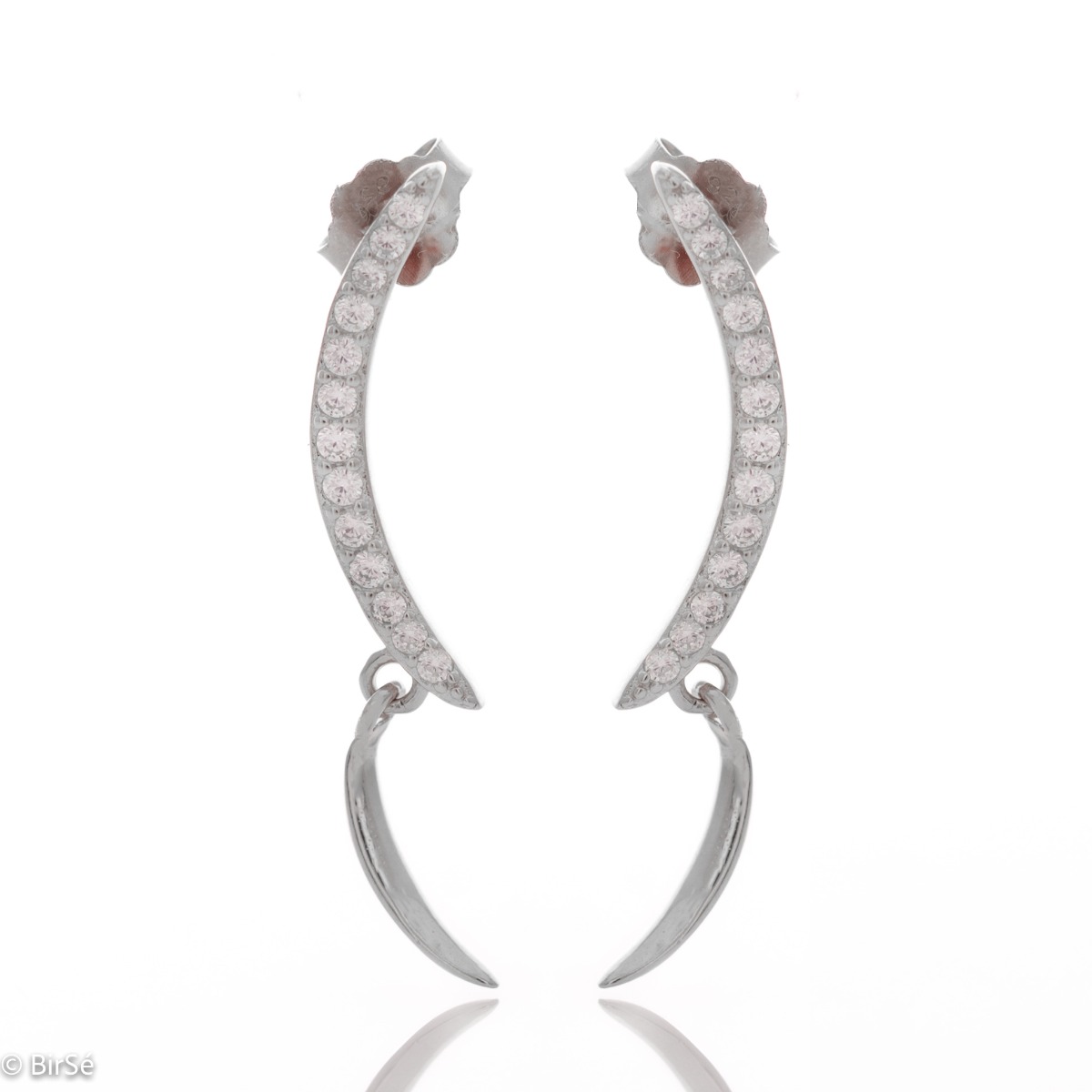 Elegant dangling earrings in fine rhodium silver, with elements decorated with sparkling zircons. Pin fastening - fast, comfortable and preferred by the ladies.