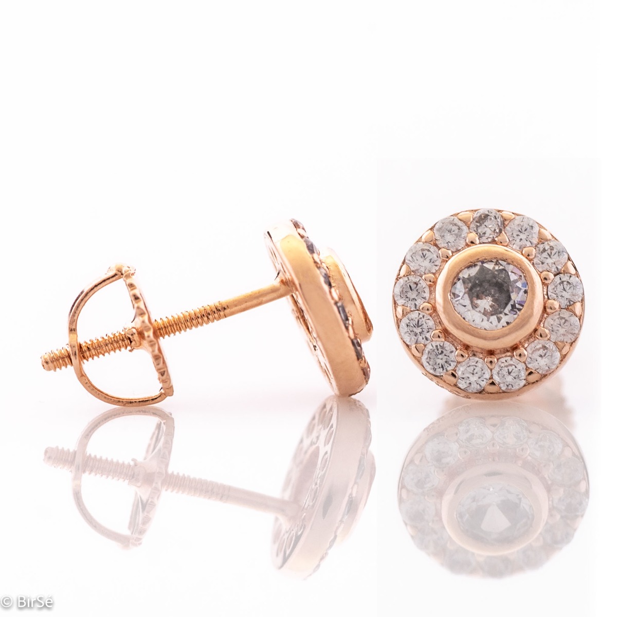 An elegant model of silver earrings, fully decorated with sparkling zircons. Screw fastening - convenient and secure. Suitable for your everyday life or to please your favorite child. Rose silver gives additional softness and charm to the jewelry.