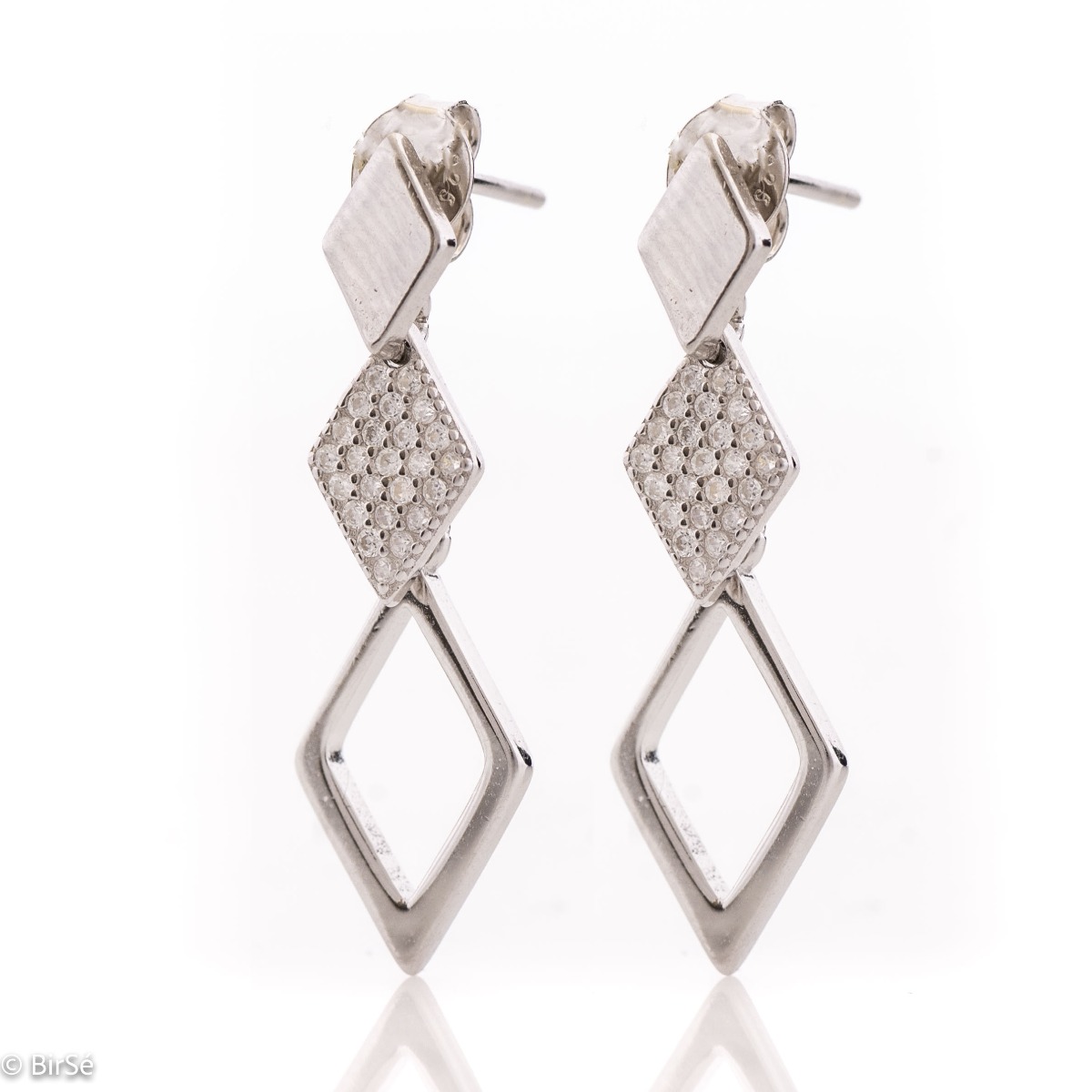 Charming women's dangle earrings crafted entirely from delicate rhodium silver and exquisitely embellished with dazzling cubic zirconias. Rhombus-shaped elements and sparkle of zircons - simply charming. Fastening with a pin is for more convenience and co