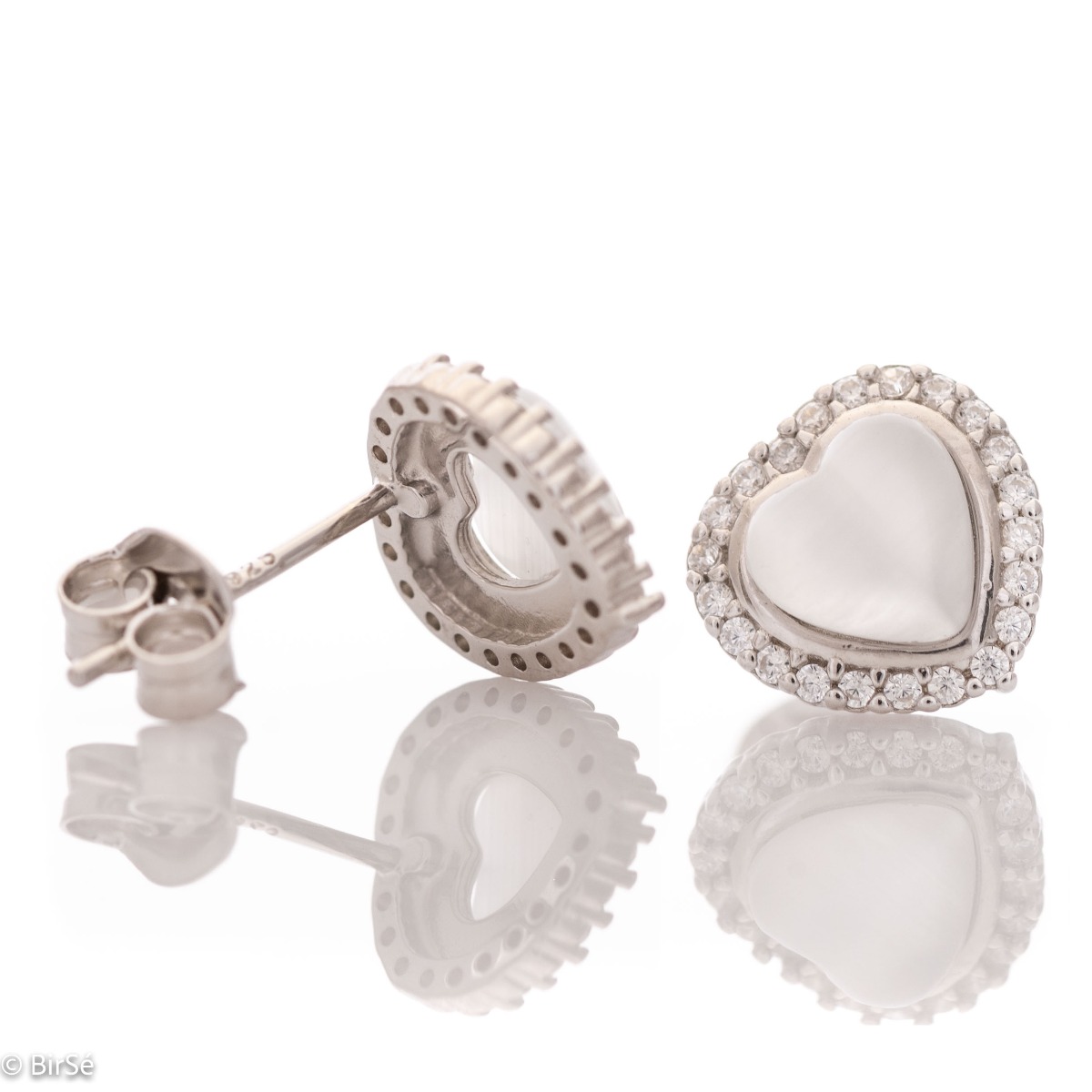 Charming earrings in fine rhodium silver, with delicate precision craftsmanship and an extremely impressive heart pattern with zircons. Earrings are a suitable piece of jewelry for a daily outfit or for a special occasion.