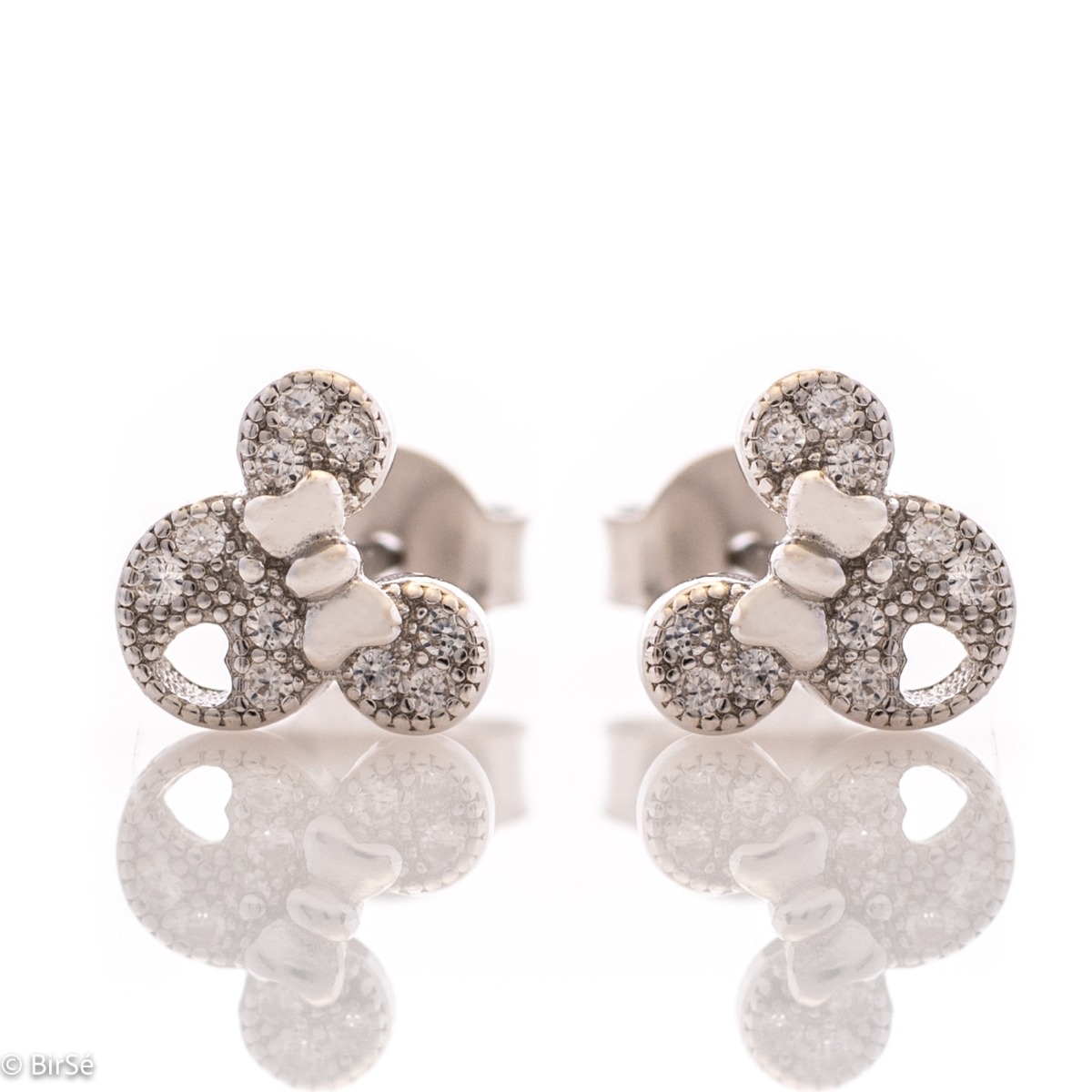 Charming earrings in fine silver in the shape of small ears, decorated with zircons and a delicate ribbon between them. They are suitable for little girls and ladies who have kept their childishness in them.