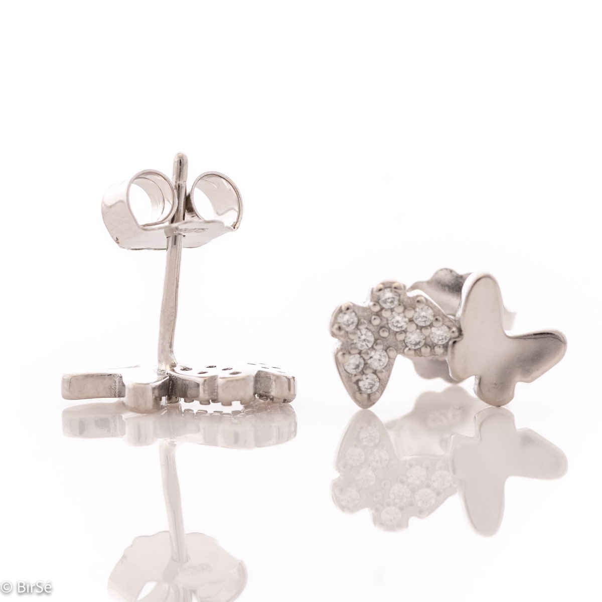 Captivating women's earrings made of rhodium-plated fine silver. An exquisite jewel with two butterflies, which are decorated with delicate zircons, with a stylish design and a comfortable pin fastening. A wonderful gift for your beloved woman.