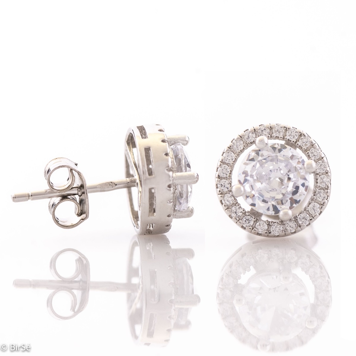 An elegant model of silver earrings, fully decorated with sparkling zircons. Fastening with a pin - convenient and practical. Suitable for your everyday life or to please your favorite child.